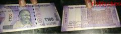 100 rs note of 786.